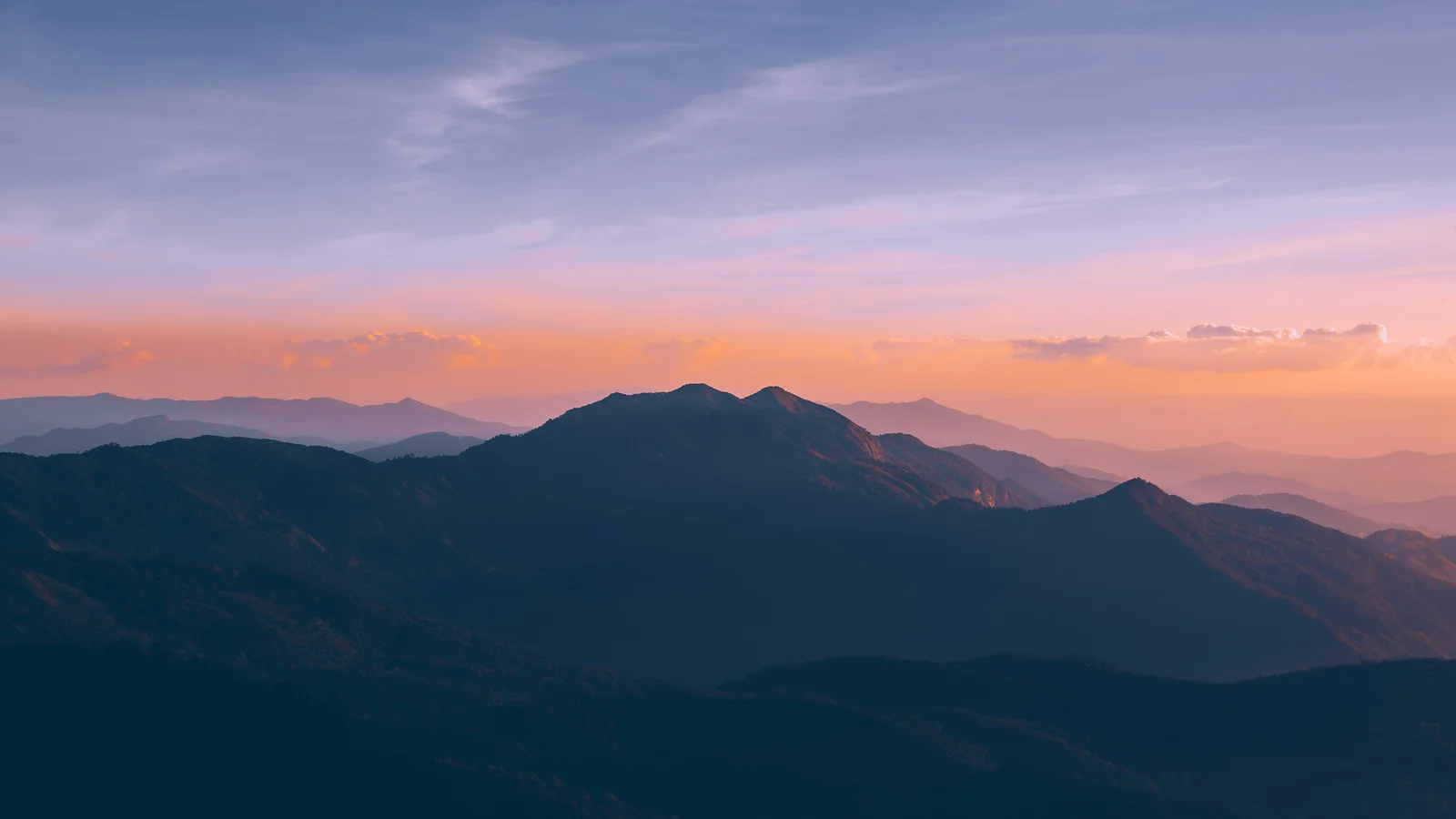 Layered mountain ridges at sunset in Doi Inthanon, Thailand